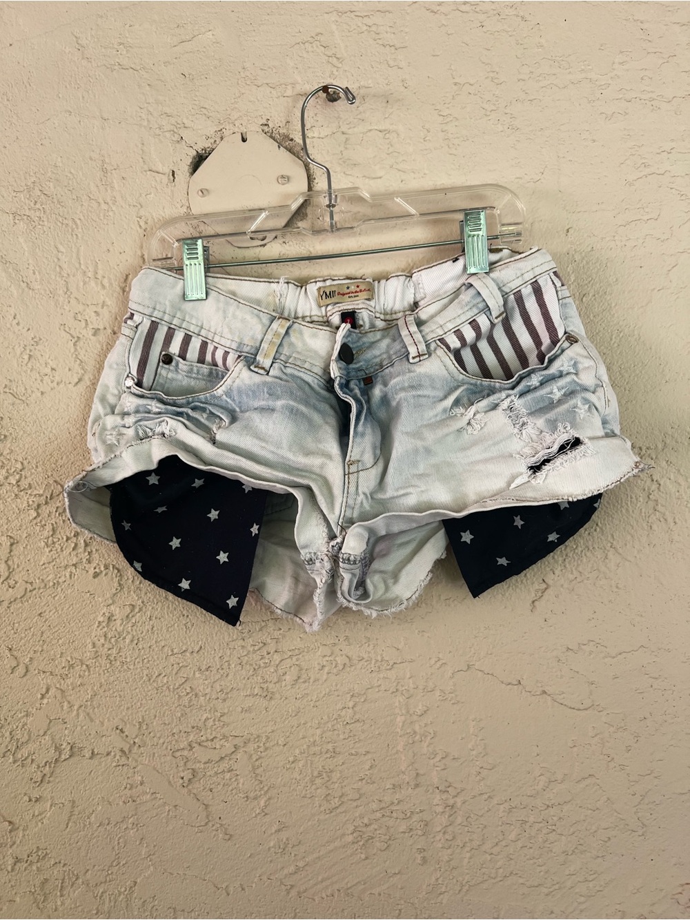 Light Wash Distressed Women's Denim Shorts with Star Liner